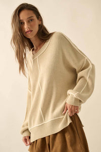 Stacy Red Exposed-Seam Oversize Sweater